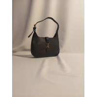 Handtas met gouden sluiting